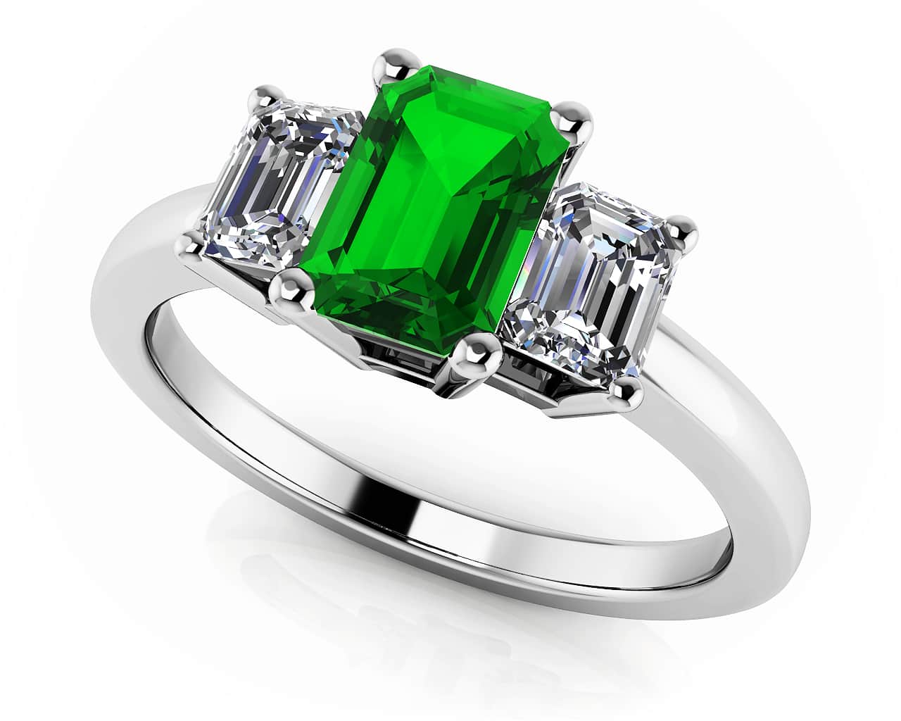Glorious Three Stone Diamond Ring with 1.10 ct.(finished) 6x4mm, 4x3mm Emerald